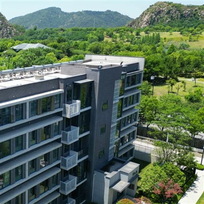 Tuiles flexibles Phomi pour façade